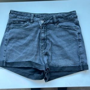 This is a black pair of jean shorts from America Eagle. They are size 4.